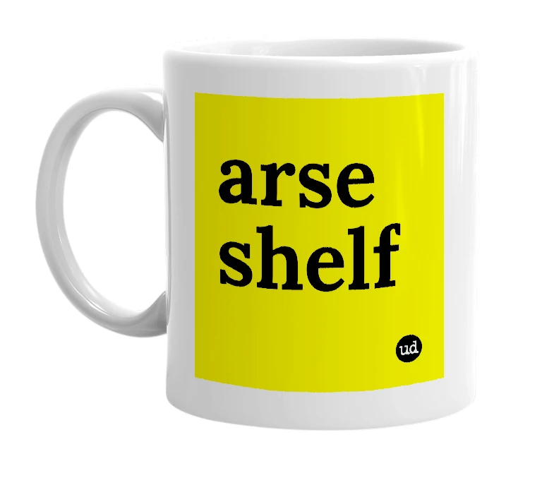 White mug with 'arse shelf' in bold black letters