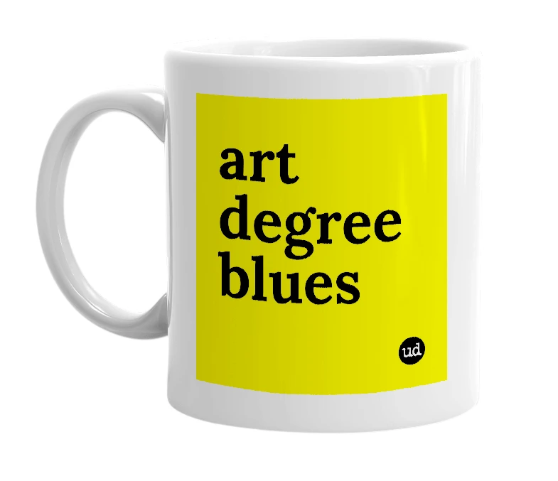 White mug with 'art degree blues' in bold black letters