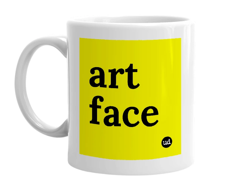 White mug with 'art face' in bold black letters