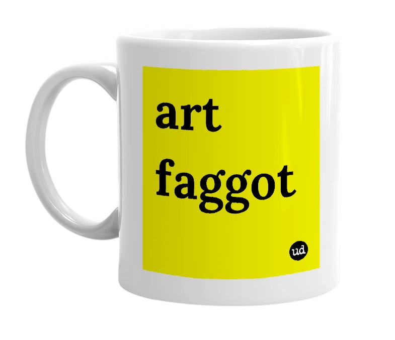 White mug with 'art faggot' in bold black letters