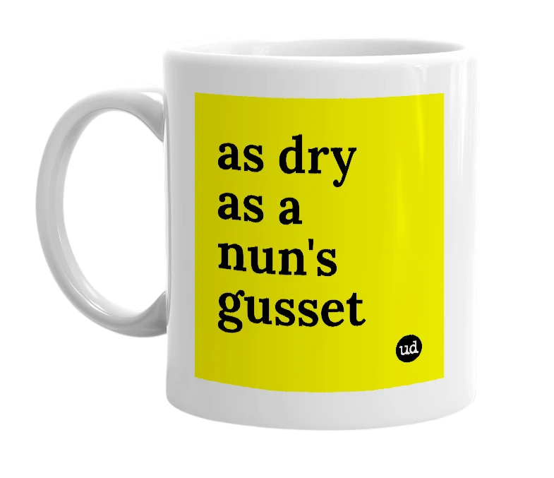 White mug with 'as dry as a nun's gusset' in bold black letters