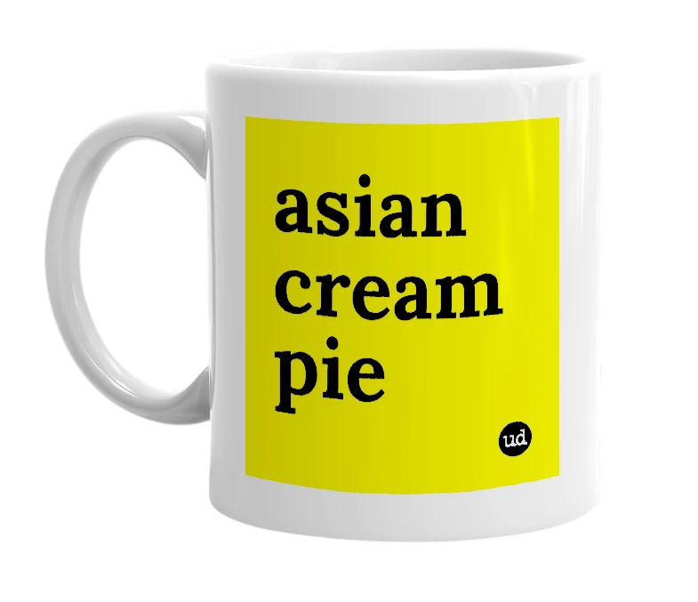 White mug with 'asian cream pie' in bold black letters