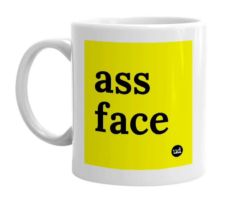 White mug with 'ass face' in bold black letters