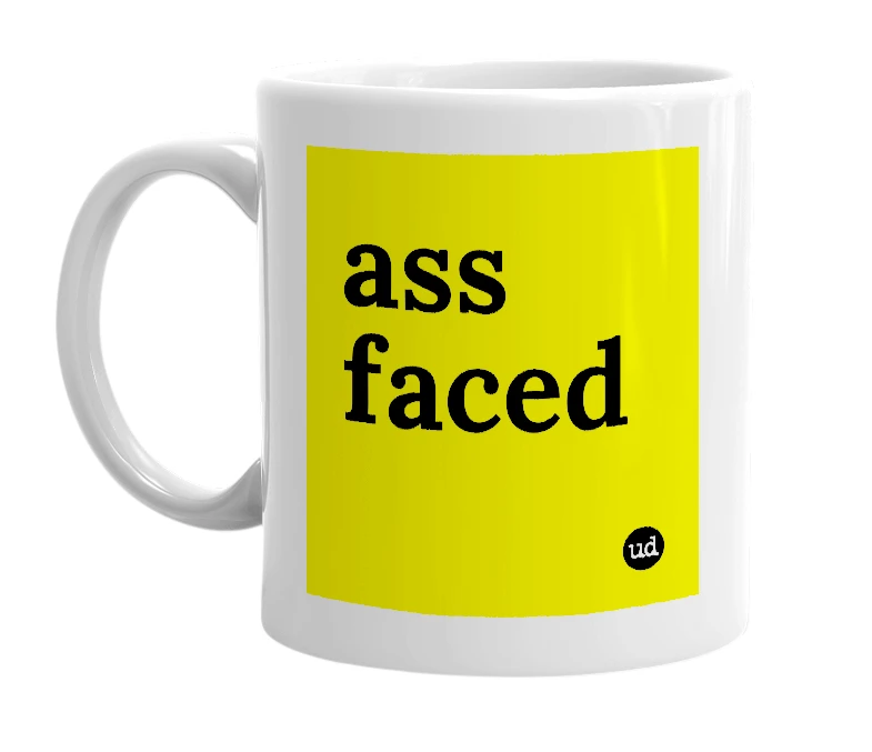 White mug with 'ass faced' in bold black letters