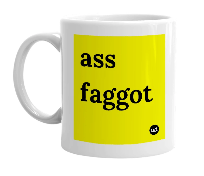 White mug with 'ass faggot' in bold black letters