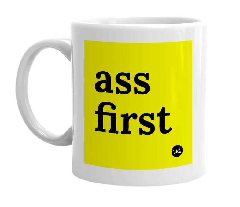 White mug with 'ass first' in bold black letters