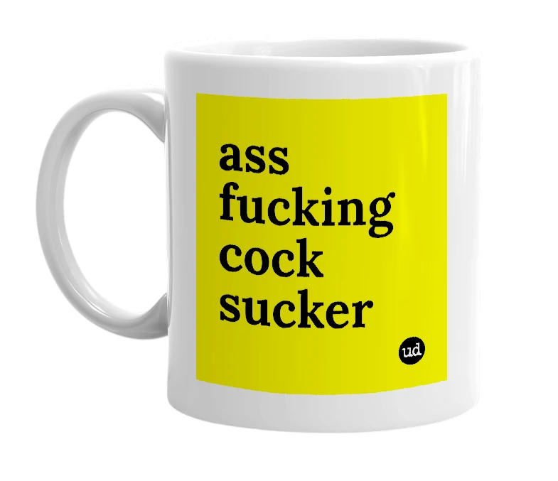 White mug with 'ass fucking cock sucker' in bold black letters