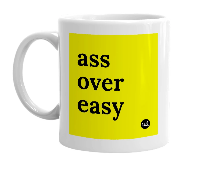 White mug with 'ass over easy' in bold black letters