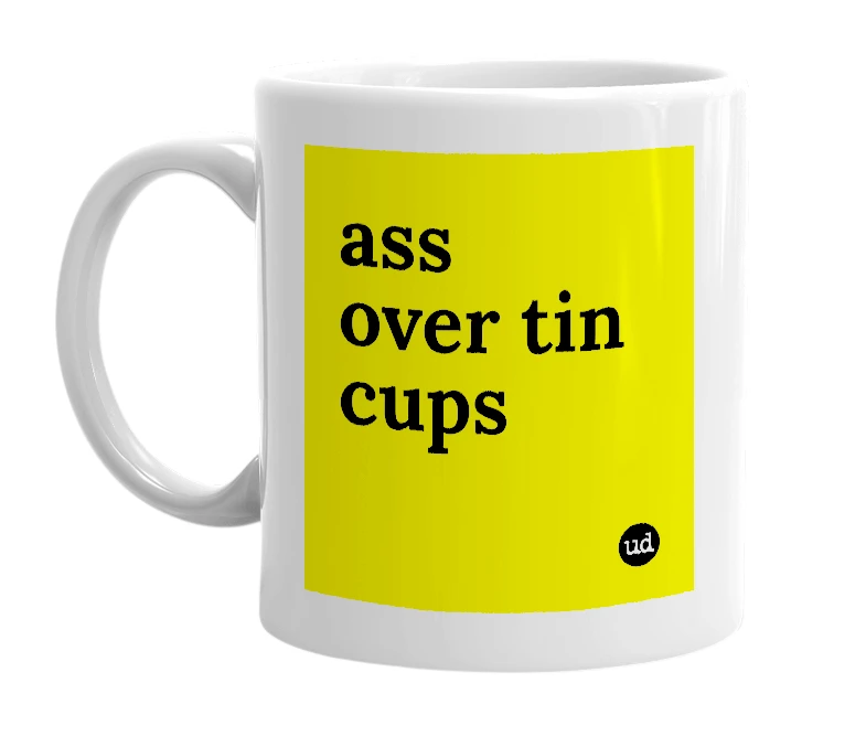 White mug with 'ass over tin cups' in bold black letters
