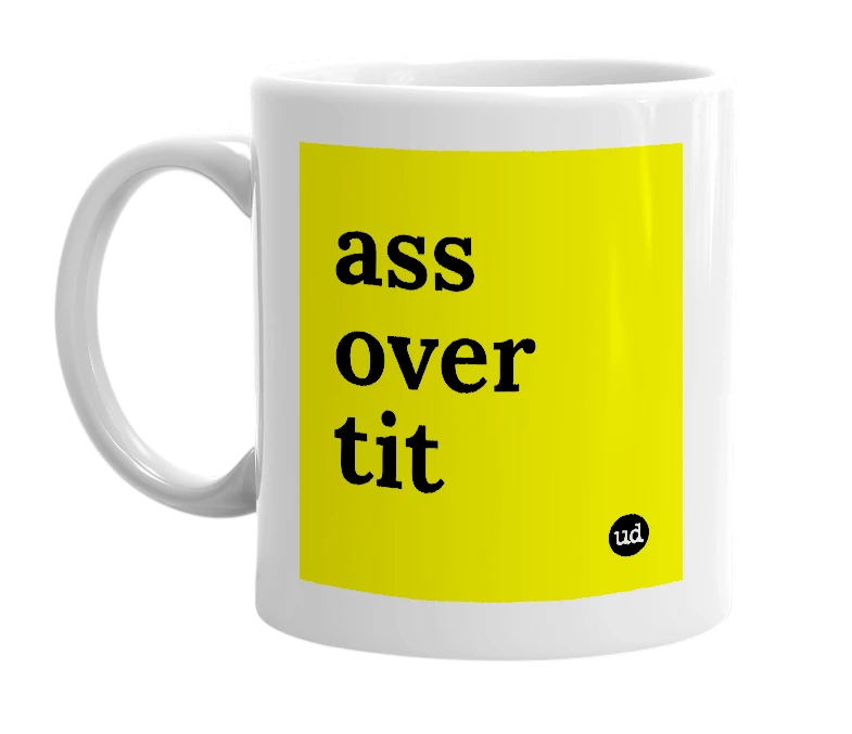 White mug with 'ass over tit' in bold black letters