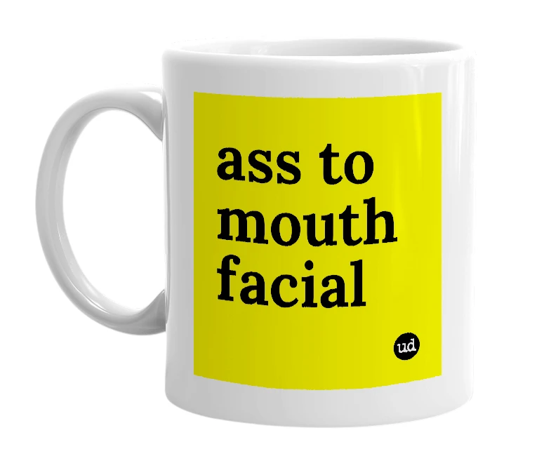 White mug with 'ass to mouth facial' in bold black letters