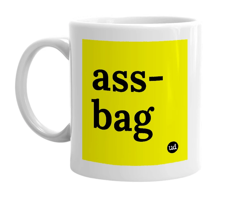 White mug with 'ass-bag' in bold black letters