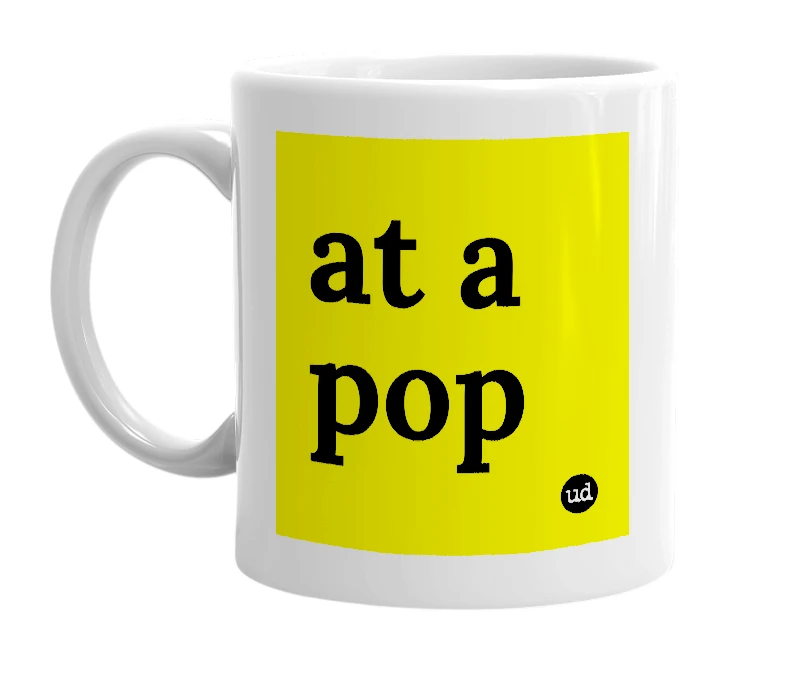 White mug with 'at a pop' in bold black letters