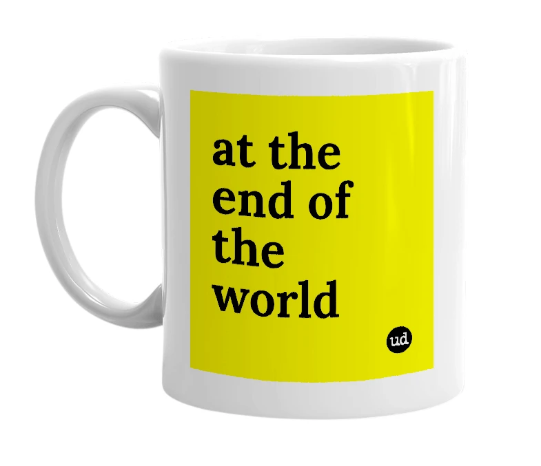 White mug with 'at the end of the world' in bold black letters