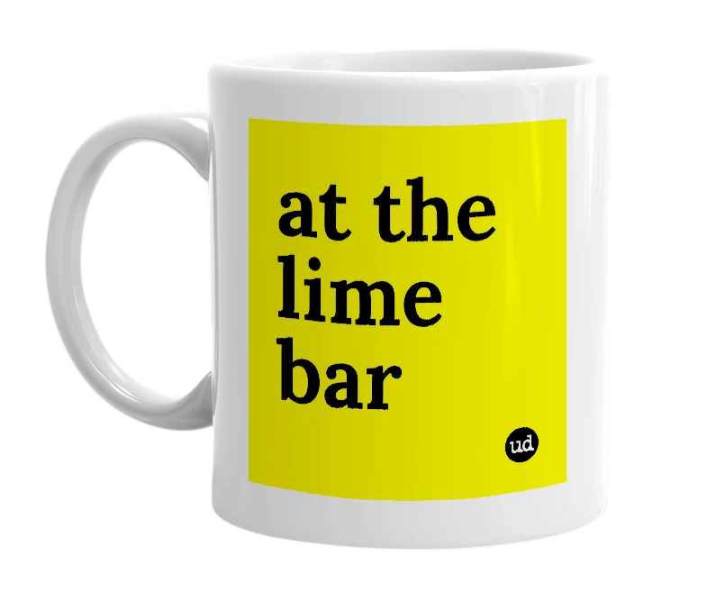 White mug with 'at the lime bar' in bold black letters