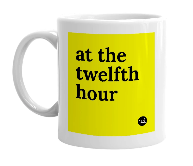 White mug with 'at the twelfth hour' in bold black letters