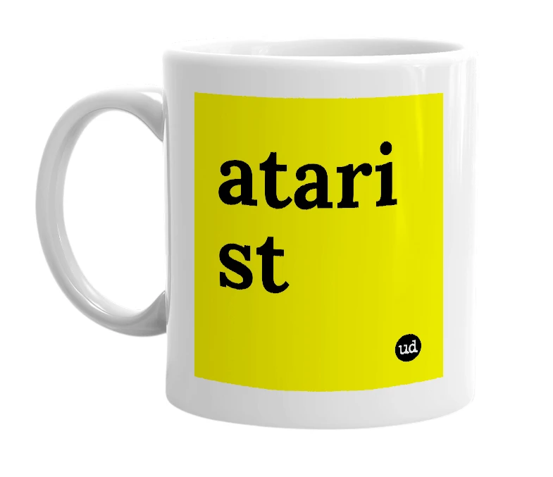 White mug with 'atari st' in bold black letters