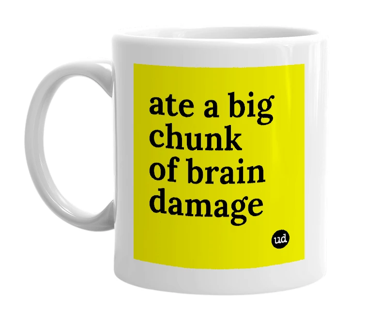 White mug with 'ate a big chunk of brain damage' in bold black letters