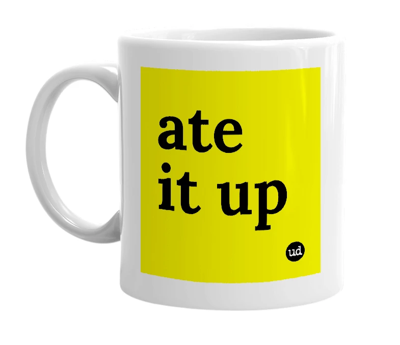 White mug with 'ate it up' in bold black letters