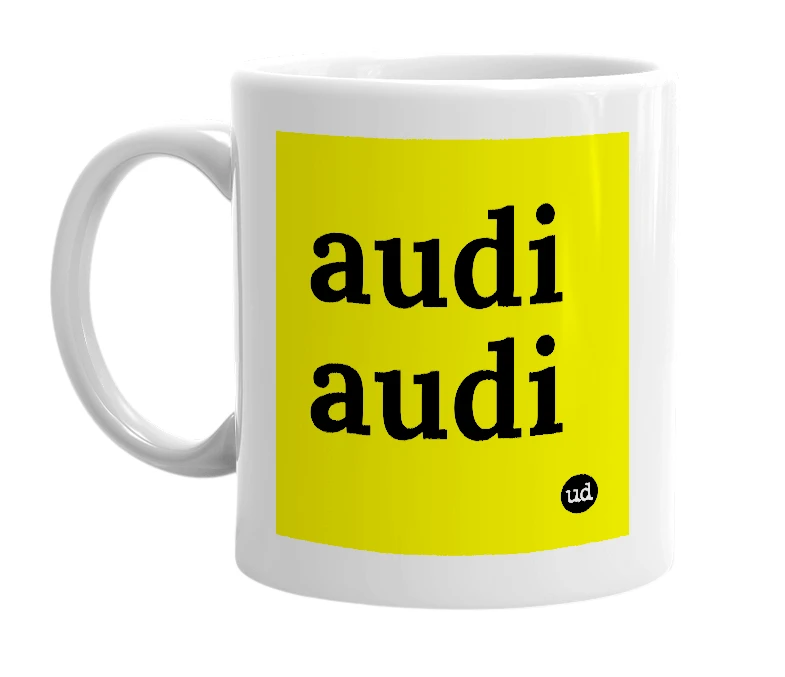 White mug with 'audi audi' in bold black letters