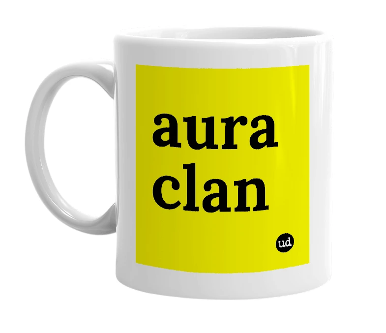 White mug with 'aura clan' in bold black letters