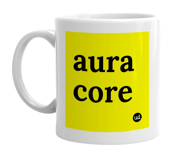 White mug with 'aura core' in bold black letters