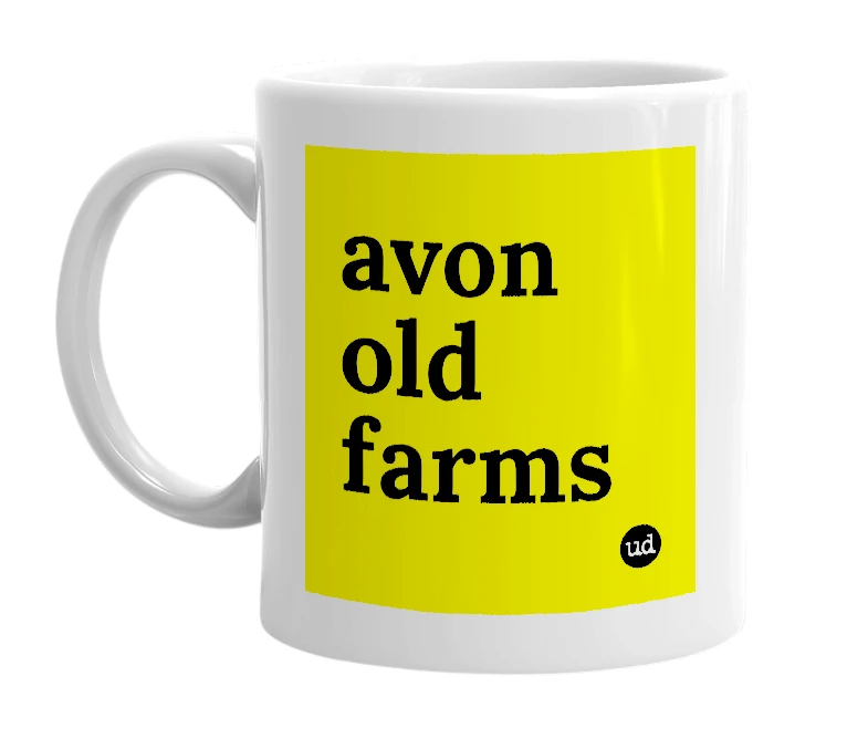 White mug with 'avon old farms' in bold black letters