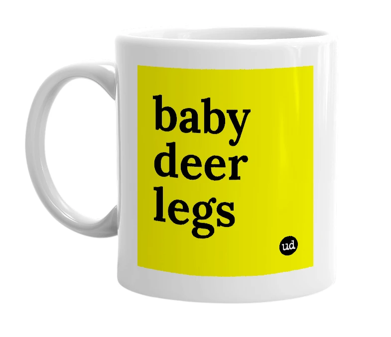 White mug with 'baby deer legs' in bold black letters