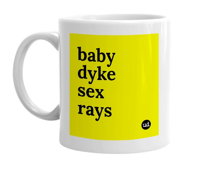 White mug with 'baby dyke sex rays' in bold black letters