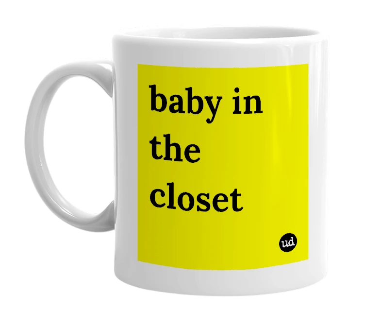 White mug with 'baby in the closet' in bold black letters
