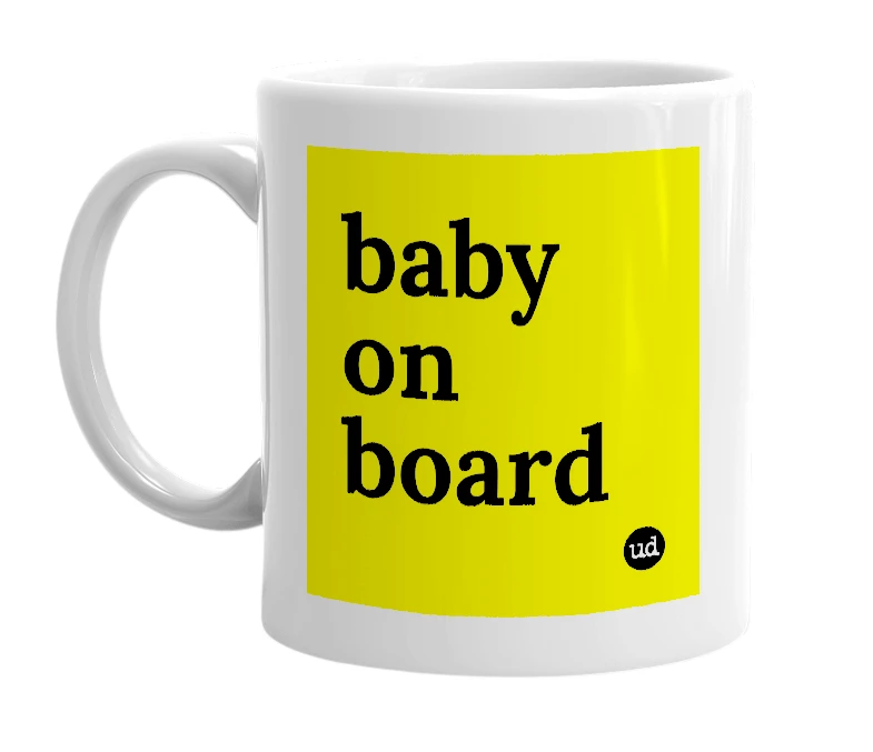 White mug with 'baby on board' in bold black letters