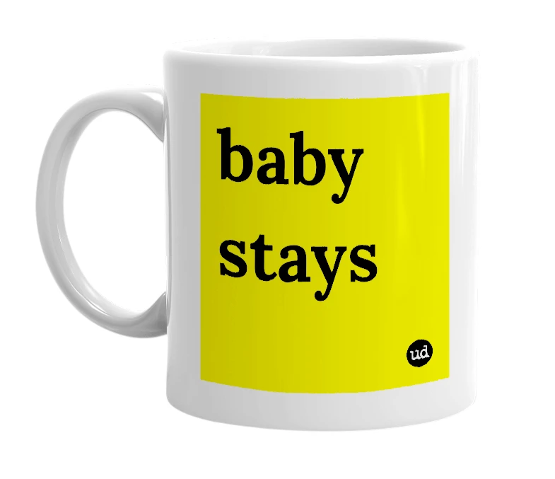 White mug with 'baby stays' in bold black letters