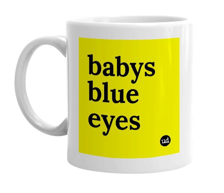 White mug with 'babys blue eyes' in bold black letters