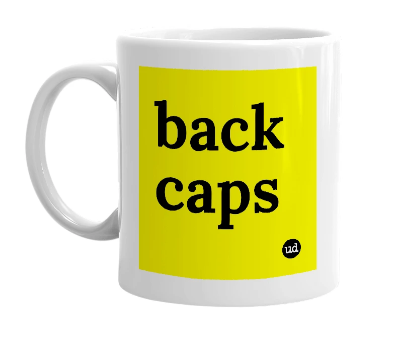 White mug with 'back caps' in bold black letters