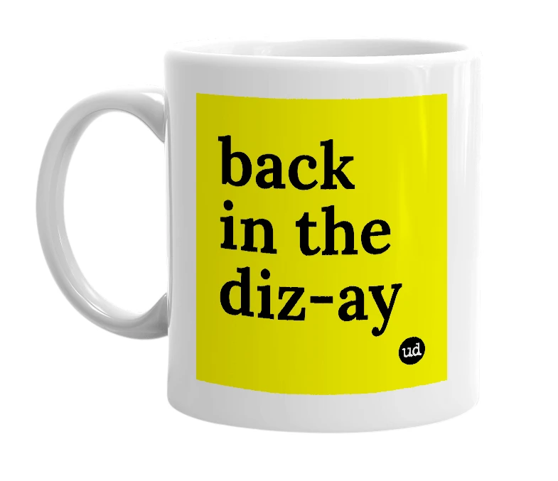 White mug with 'back in the diz-ay' in bold black letters