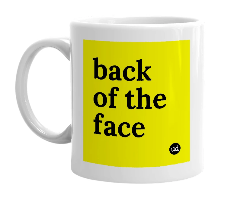 White mug with 'back of the face' in bold black letters