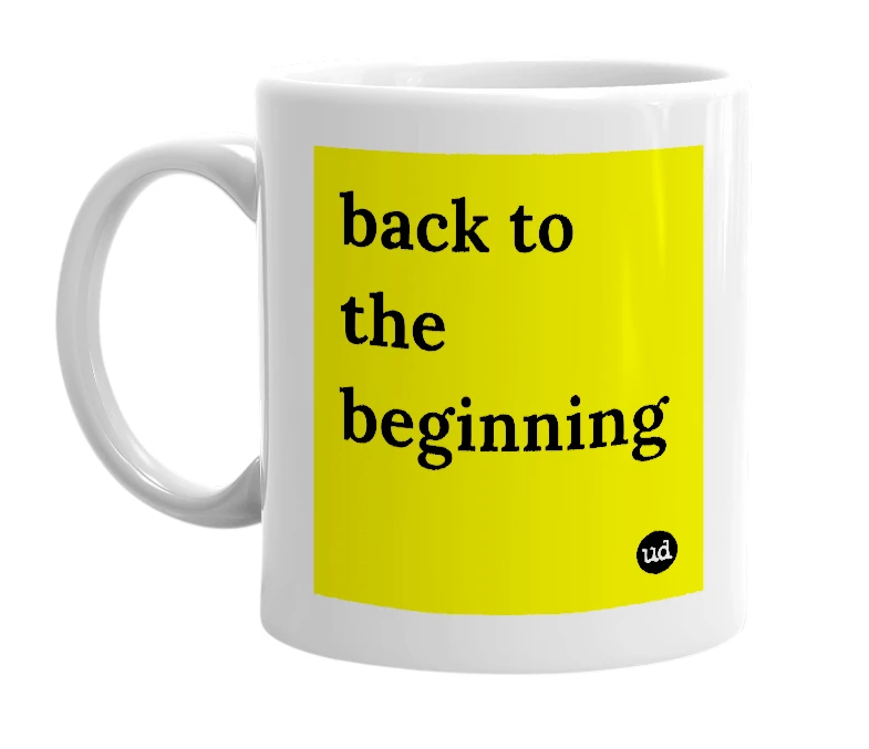 White mug with 'back to the beginning' in bold black letters