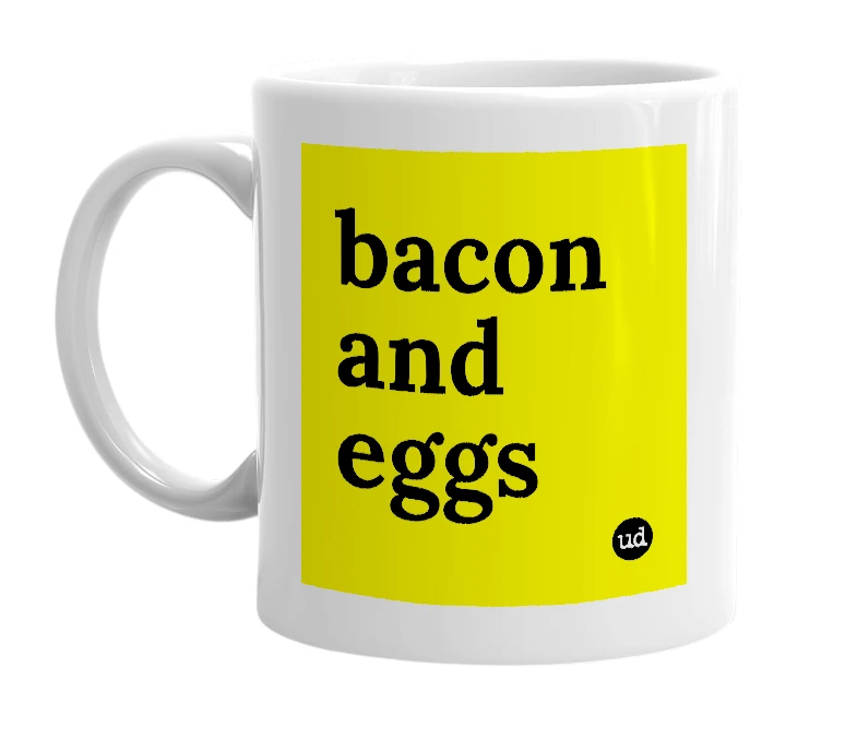 White mug with 'bacon and eggs' in bold black letters