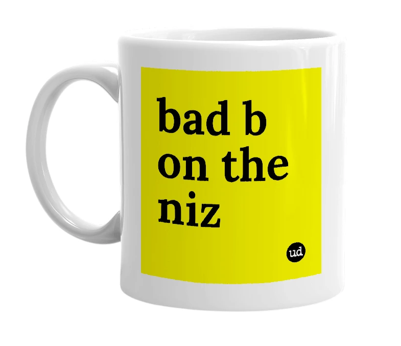 White mug with 'bad b on the niz' in bold black letters