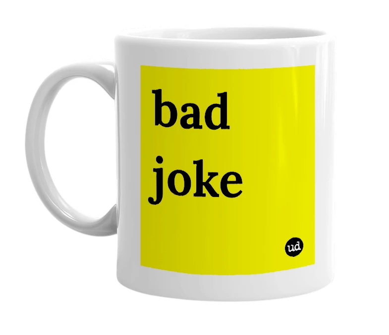 White mug with 'bad joke' in bold black letters