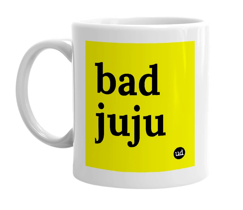 White mug with 'bad juju' in bold black letters