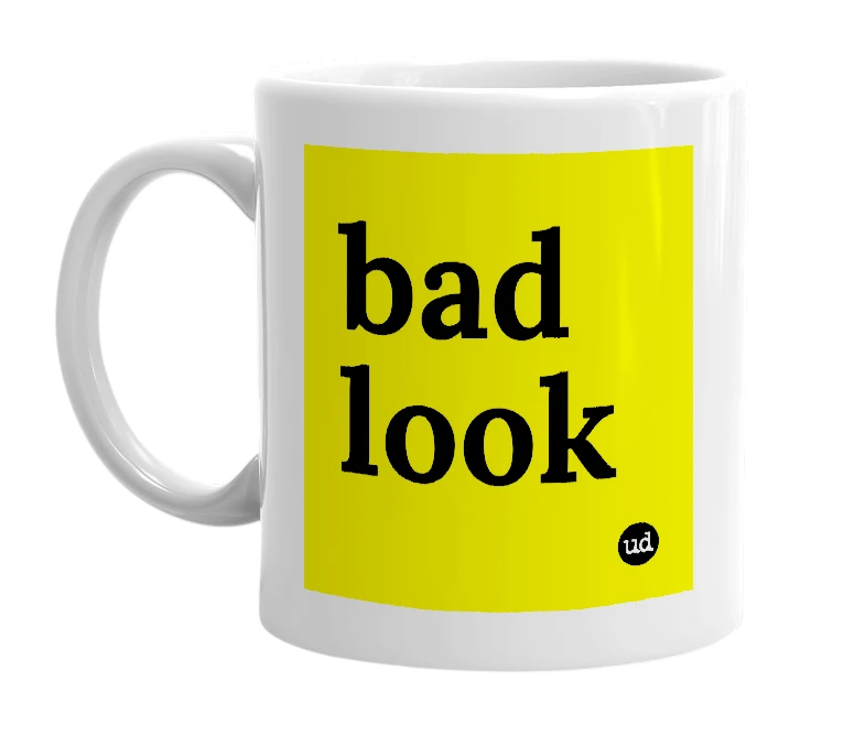 White mug with 'bad look' in bold black letters