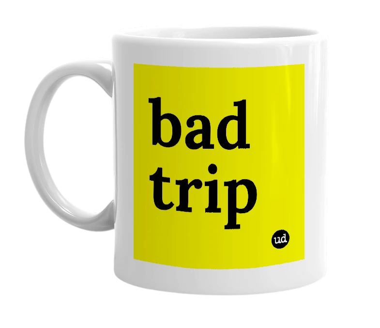 White mug with 'bad trip' in bold black letters