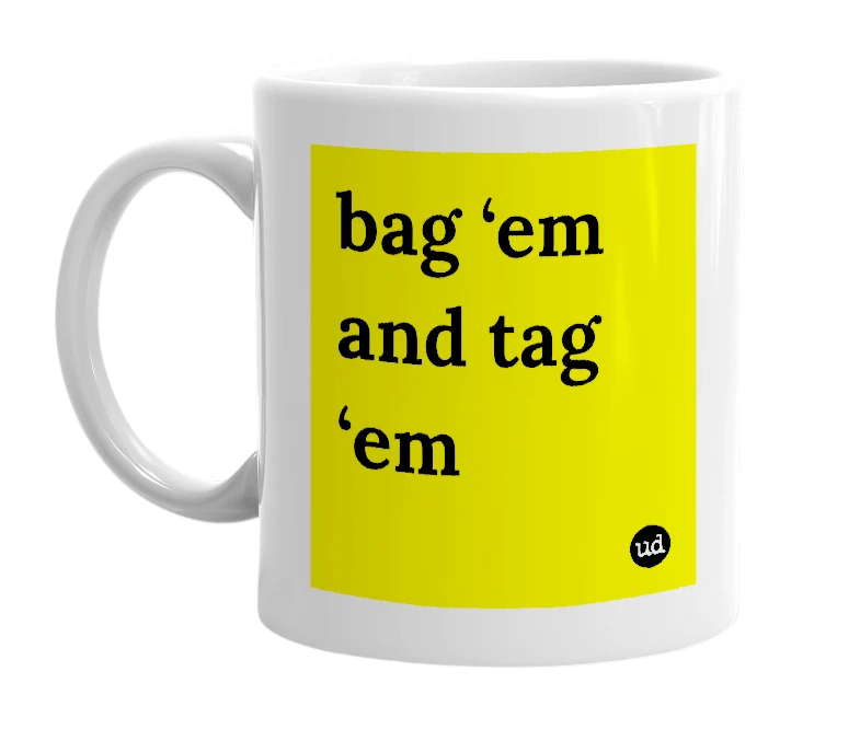 White mug with 'bag ‘em and tag ‘em' in bold black letters