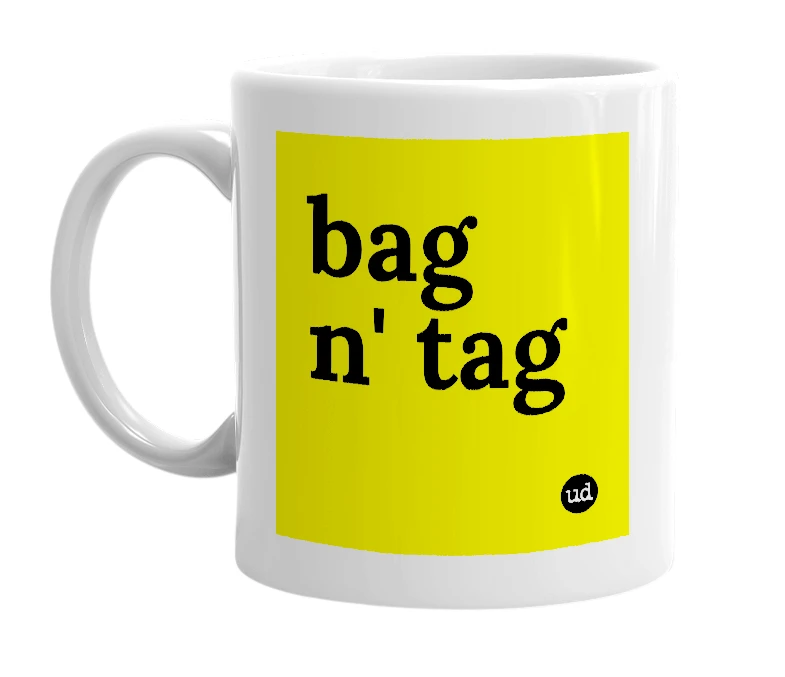 White mug with 'bag n' tag' in bold black letters