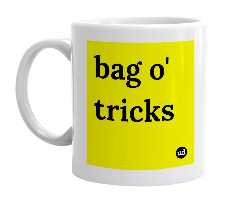 White mug with 'bag o' tricks' in bold black letters