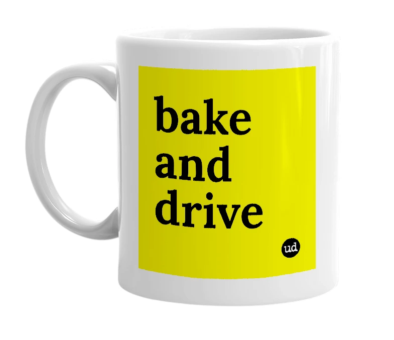 White mug with 'bake and drive' in bold black letters