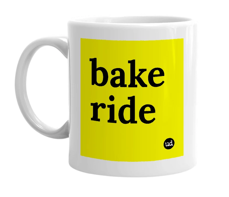 White mug with 'bake ride' in bold black letters
