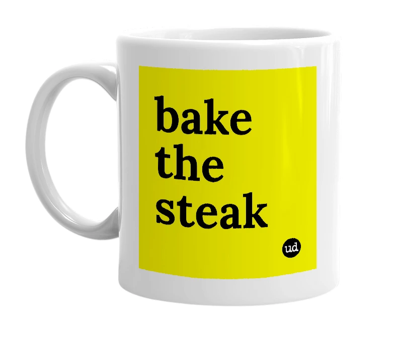 White mug with 'bake the steak' in bold black letters