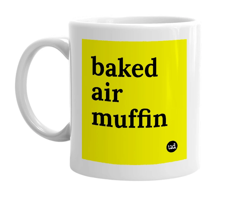 White mug with 'baked air muffin' in bold black letters